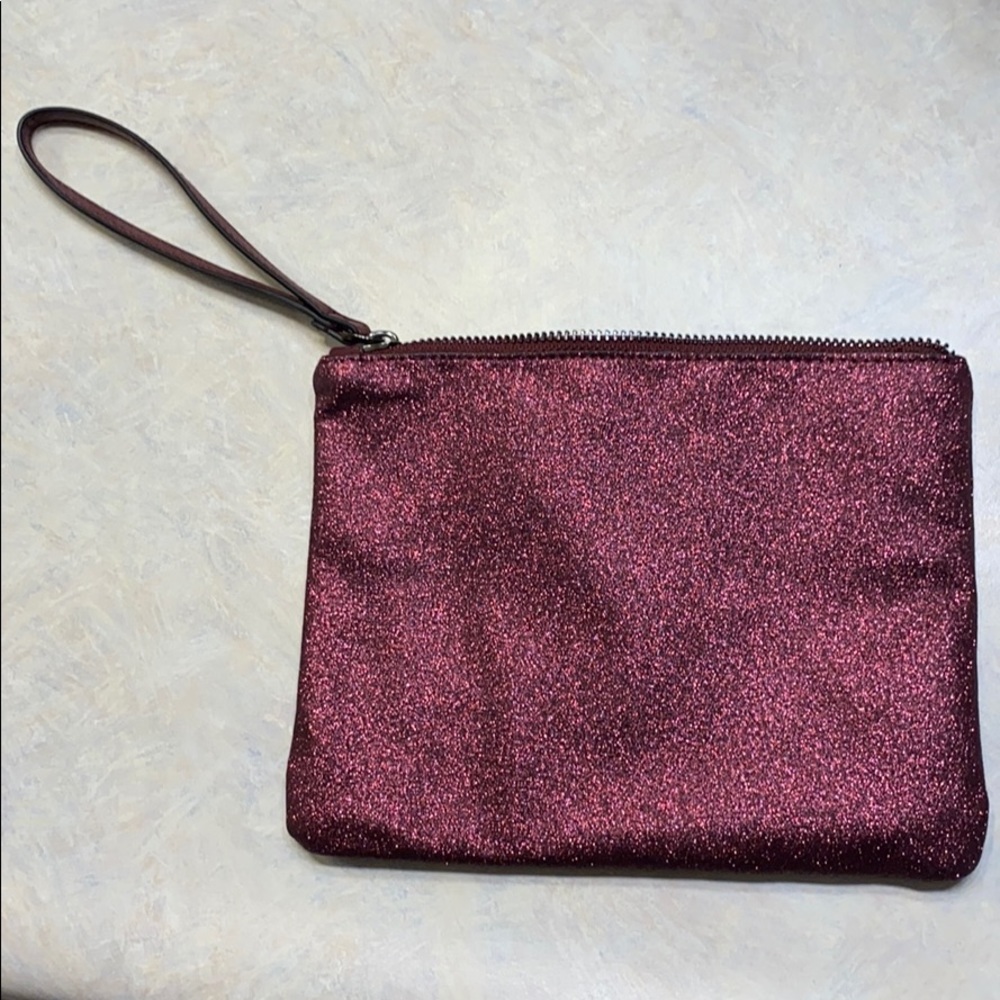 A New Day wristlet sparking burgundy gently used